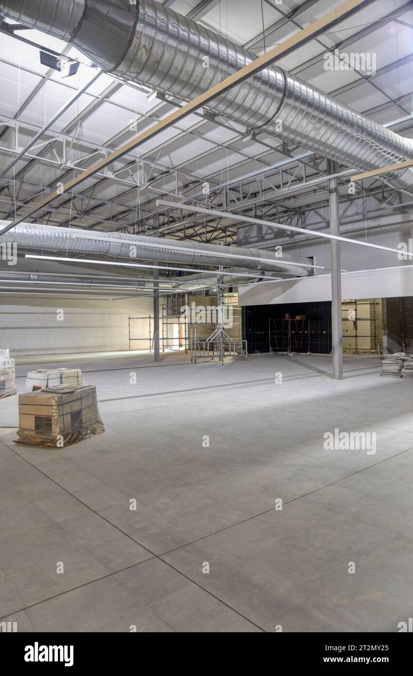 industrial air conditioning hvac in the ceiling of a warehouse in