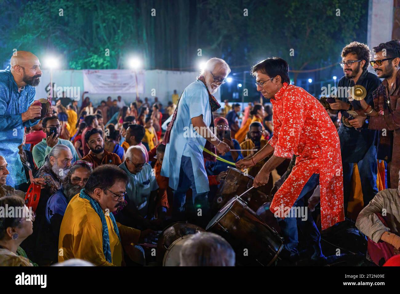 A band is seen playing traditional indian instruments during the