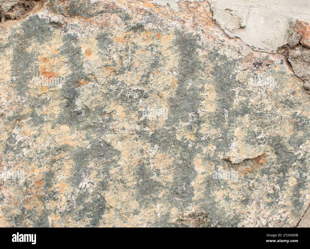 Abstract natural rock stone granite grunge rusty metal texture design background. natural color stone material granite design wallpaper. Stock Photo