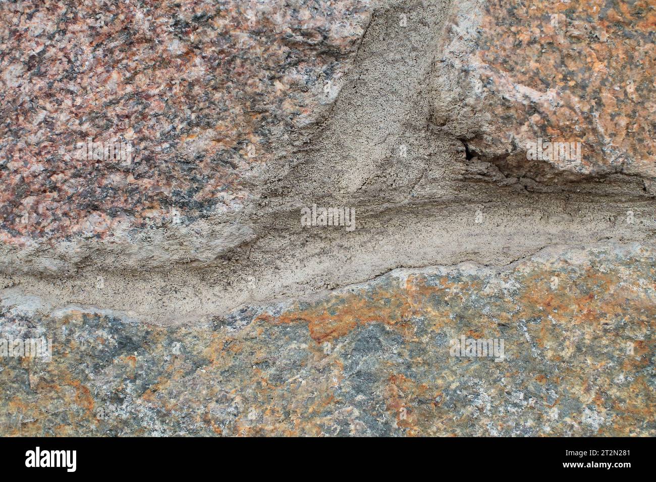 Abstract natural rock stone granite grunge rusty metal texture design background. natural color stone material granite design wallpaper. Stock Photo