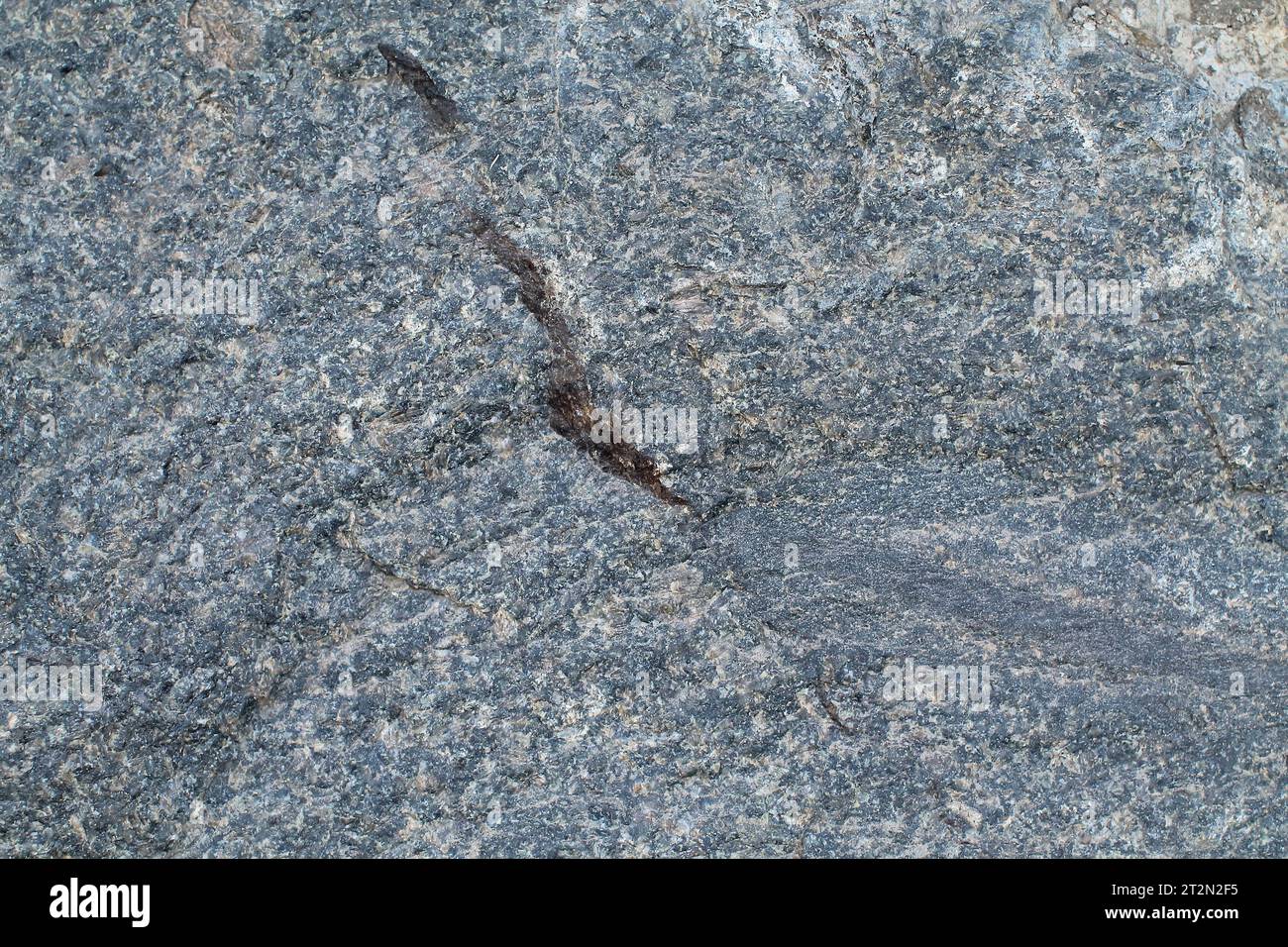 Abstract natural rock stone granite grunge rusty metal texture design background. natural color stone material granite design wallpaper. Stock Photo