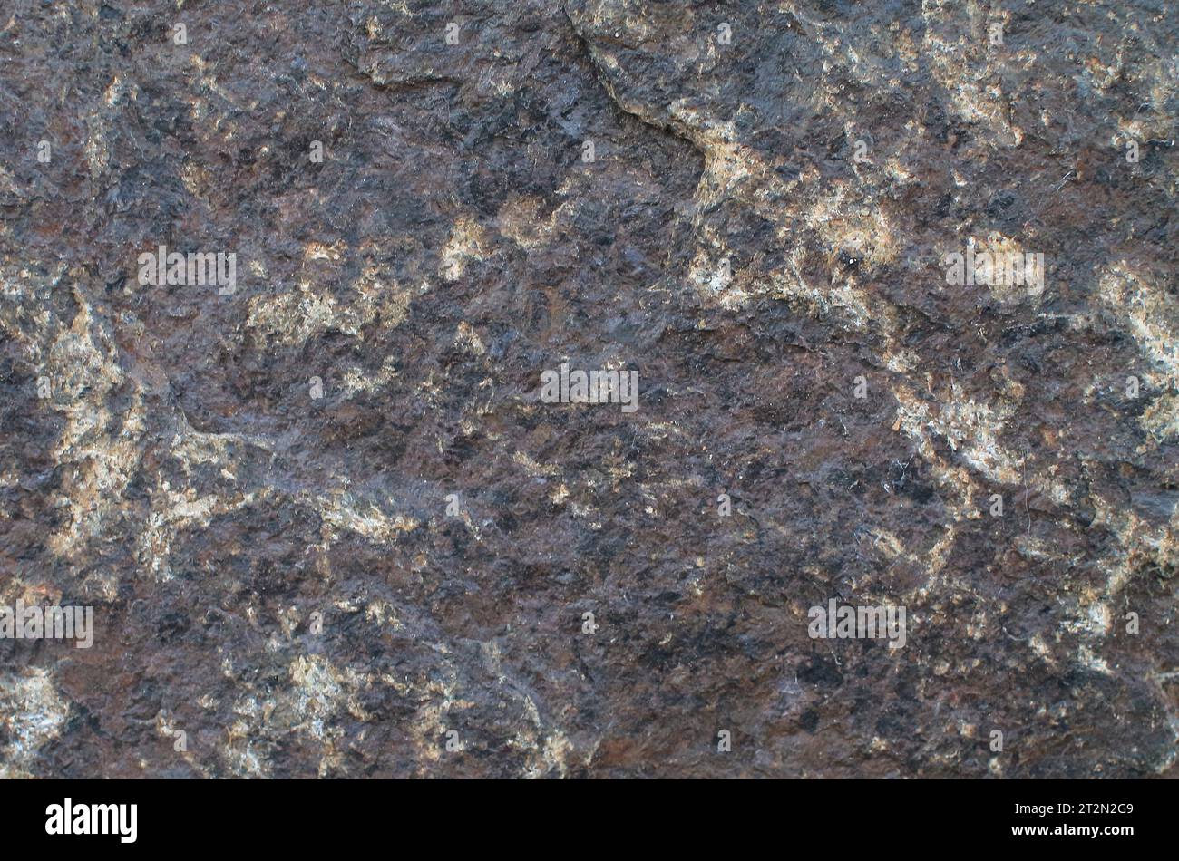 Abstract natural rock stone granite grunge rusty metal texture design background. natural color stone material granite design wallpaper. Stock Photo