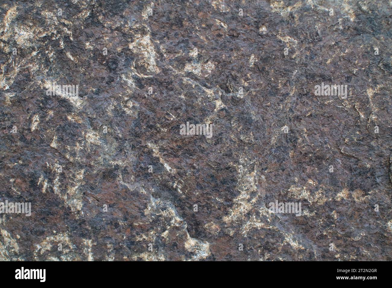 Abstract natural rock stone granite grunge rusty metal texture design background. natural color stone material granite design wallpaper. Stock Photo