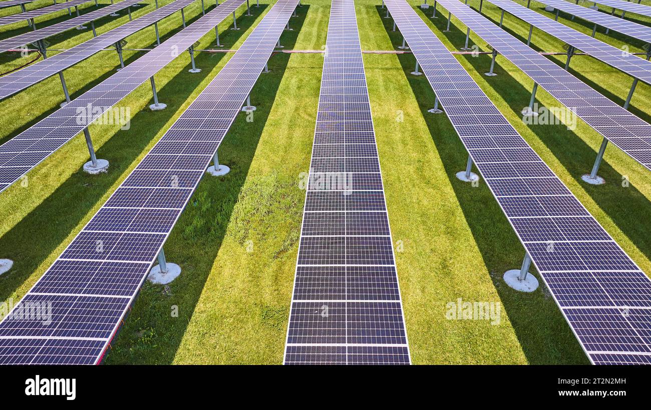 Low aerial of solar farm with vertical panels on summer day Stock Photo ...