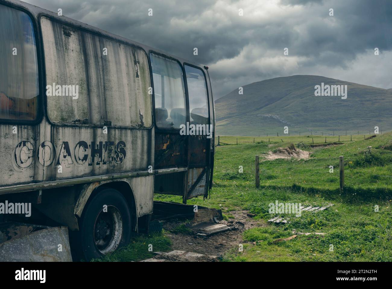 The Scarista Bus is an old abandoned bus amongst the dunes at Scarista Beach, Isle of Harris which was once a Scouts shelter. Stock Photo