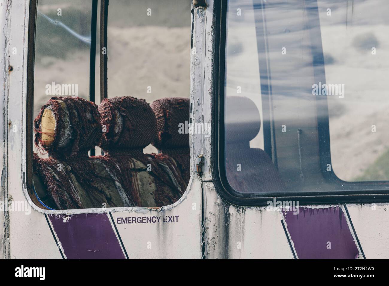 The Scarista Bus is an old abandoned bus amongst the dunes at Scarista Beach, Isle of Harris which was once a Scouts shelter. Stock Photo