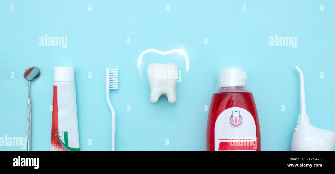 Close up of a toothbrush, toothpaste, irrigator, mouthwash for teeth ...