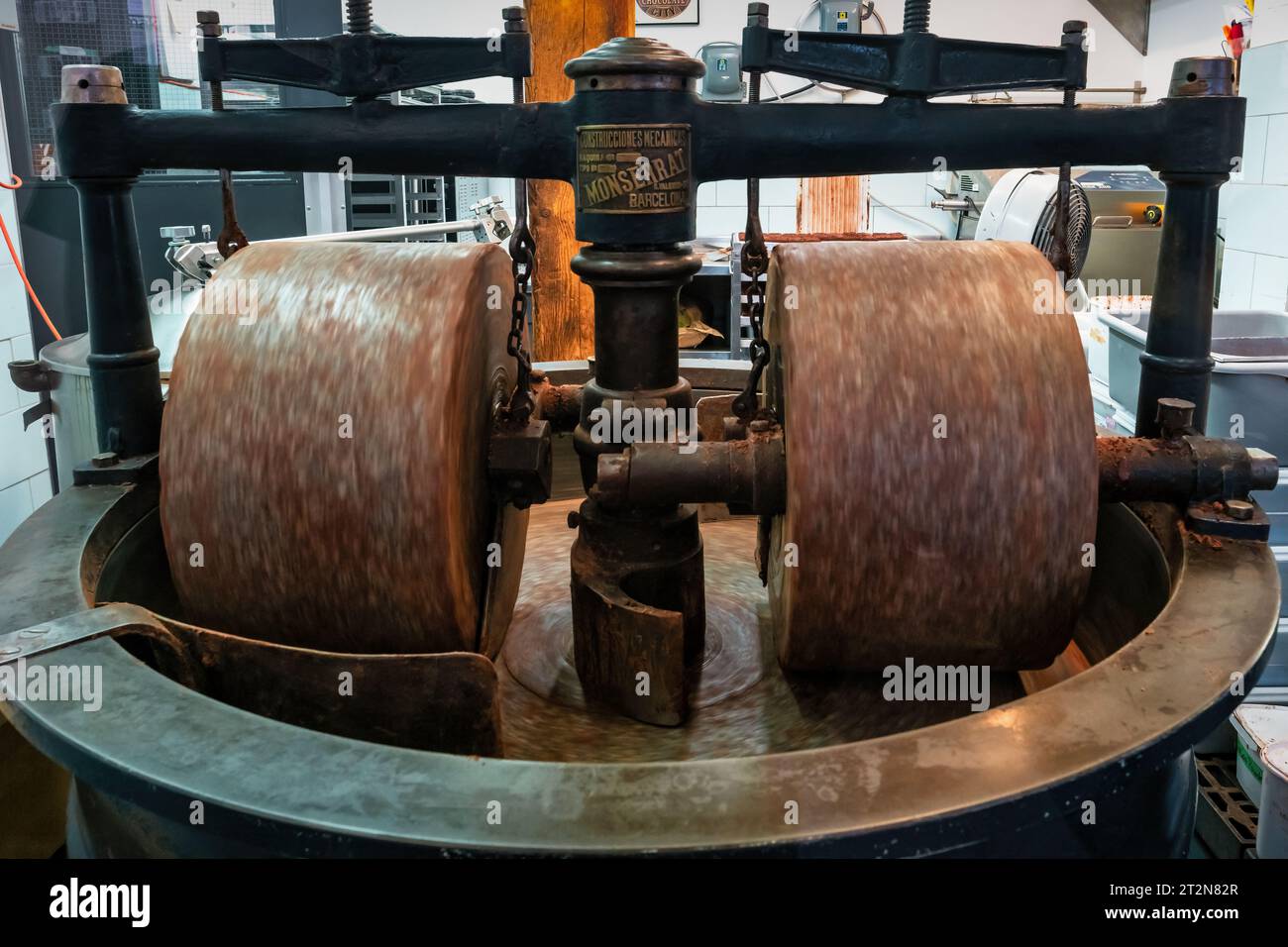 Old fashioned cocoa bean grinder at a chocolate shop in the Distillery District, Toronto, Ontario, Canada. Stock Photo