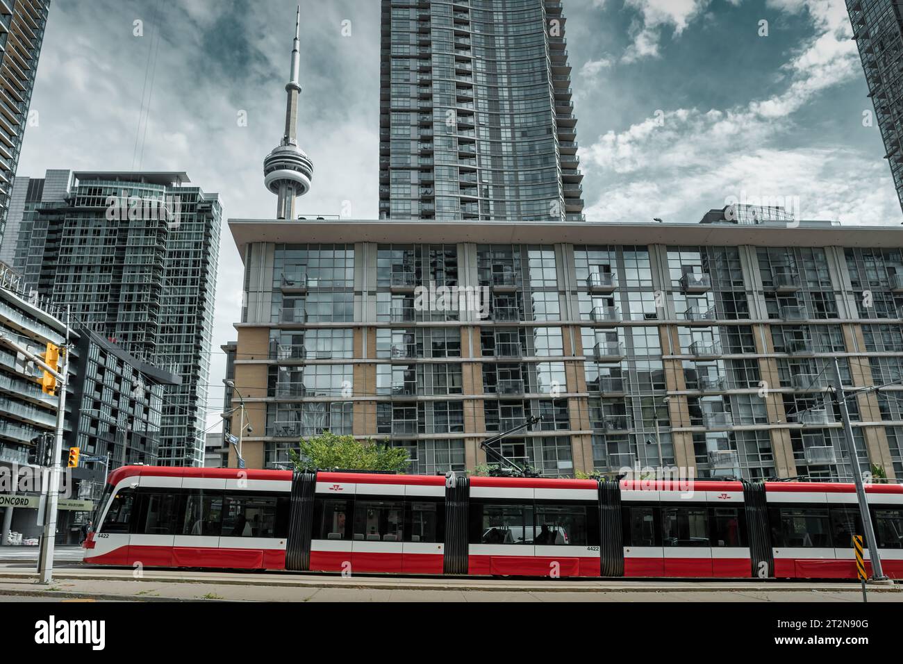 Red streetcar and condos in downtown Toronto, Ontario, Canada. Stock Photo