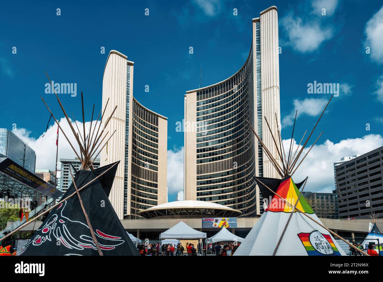 Tipis and the City Hall during a Native American Festival in downtown Toronto, Ontario, Canada. Stock Photo