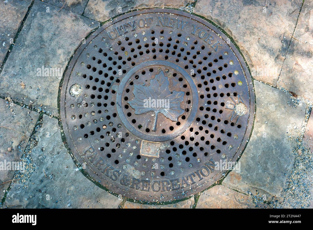 New York Parks and Recreation Manhole Cover in NYC Stock Photo