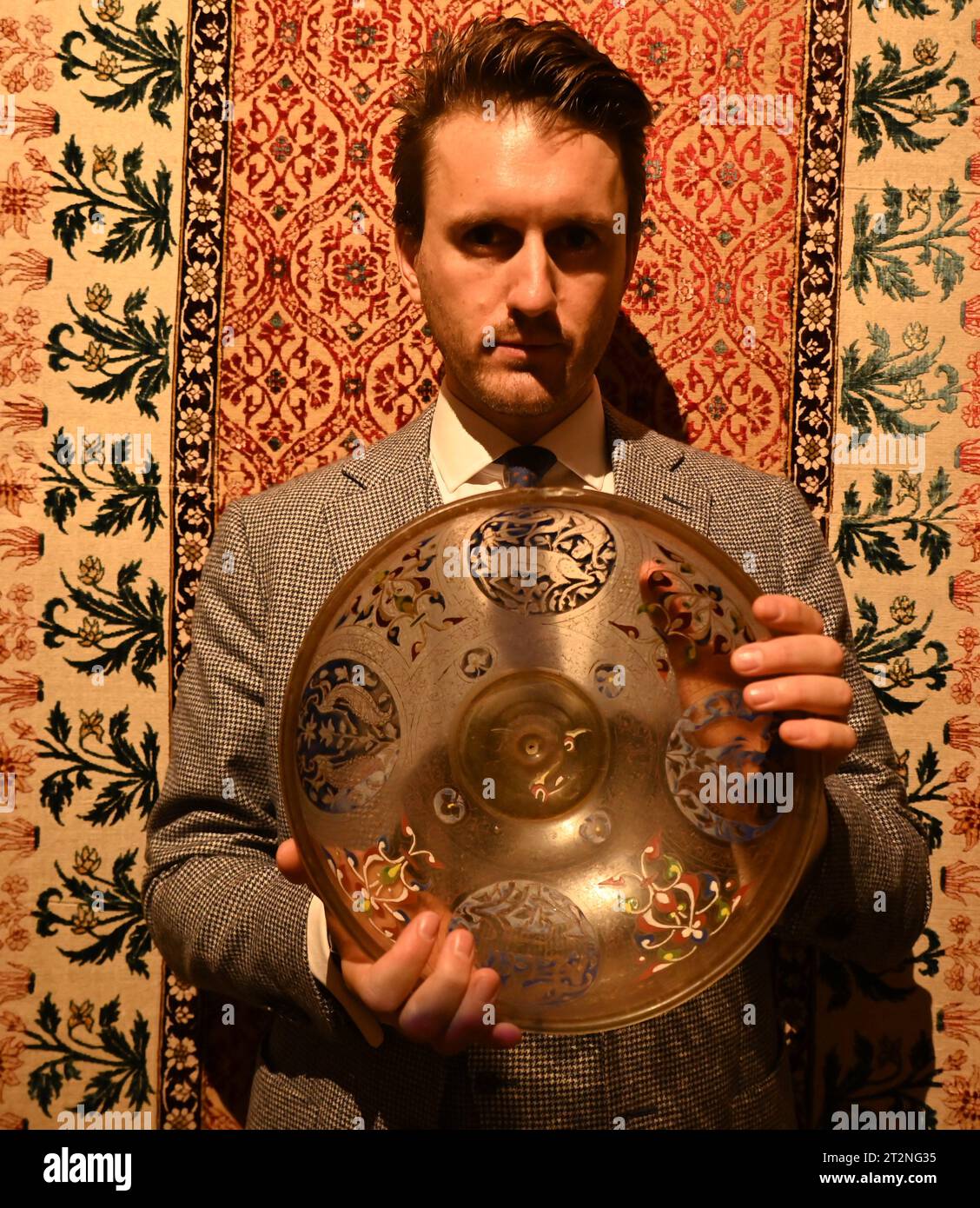 The rarest Astrolabe to appear at auction, circa 900 AD (estimate: £1,500,000-2,500,000)  An exquisite 14th-century Mamluk gilded and enamelled  glass bowl (estimate: £600,000-800,000)     A Grey Pelican from the Impey Album, once held in the collection of Jackie Kennedy (estimate: £120,000-180,000)     Three major Ottoman paintings, including a 17th-century portrait of Sultan Mehmet II (estimate: £80,000-120,000)     ALONGSIDE     Modern & Contemporary Arab, Turkish and Indian Art  Including Seminal Canvases by Fahrelnissa Zeid, Huguette Caland, Bhupen Khakhar & Manjit Bawa Stock Photo