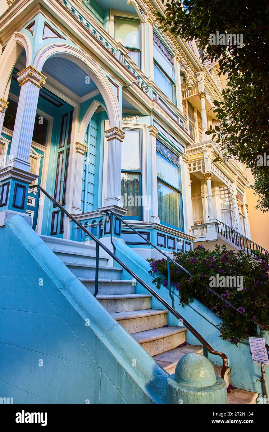 Front steps of The Painted Ladies with sky blue trim on closest set of ...