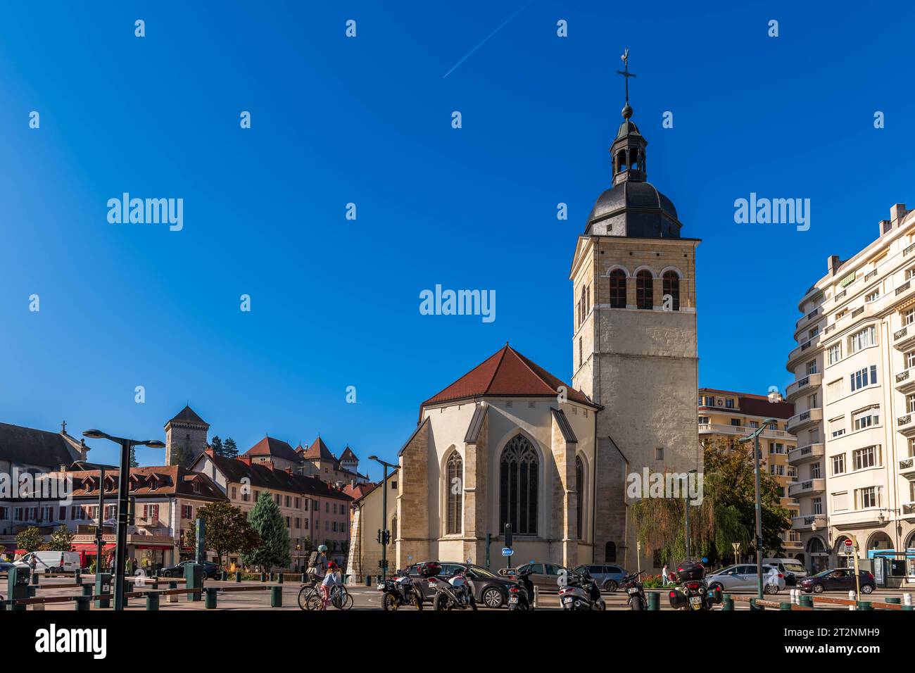 Rear of the Saint Maurice church and its bell tower, and a residence, in Annecy, Haute Savoie, France Stock Photo