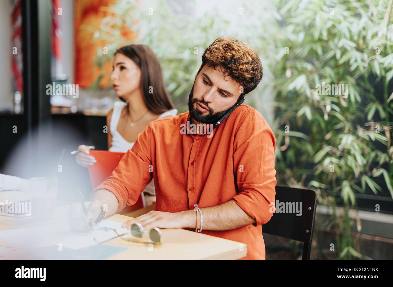 Architectural Team Discussing Profitable Sustainable Design Project Plans Stock Photo