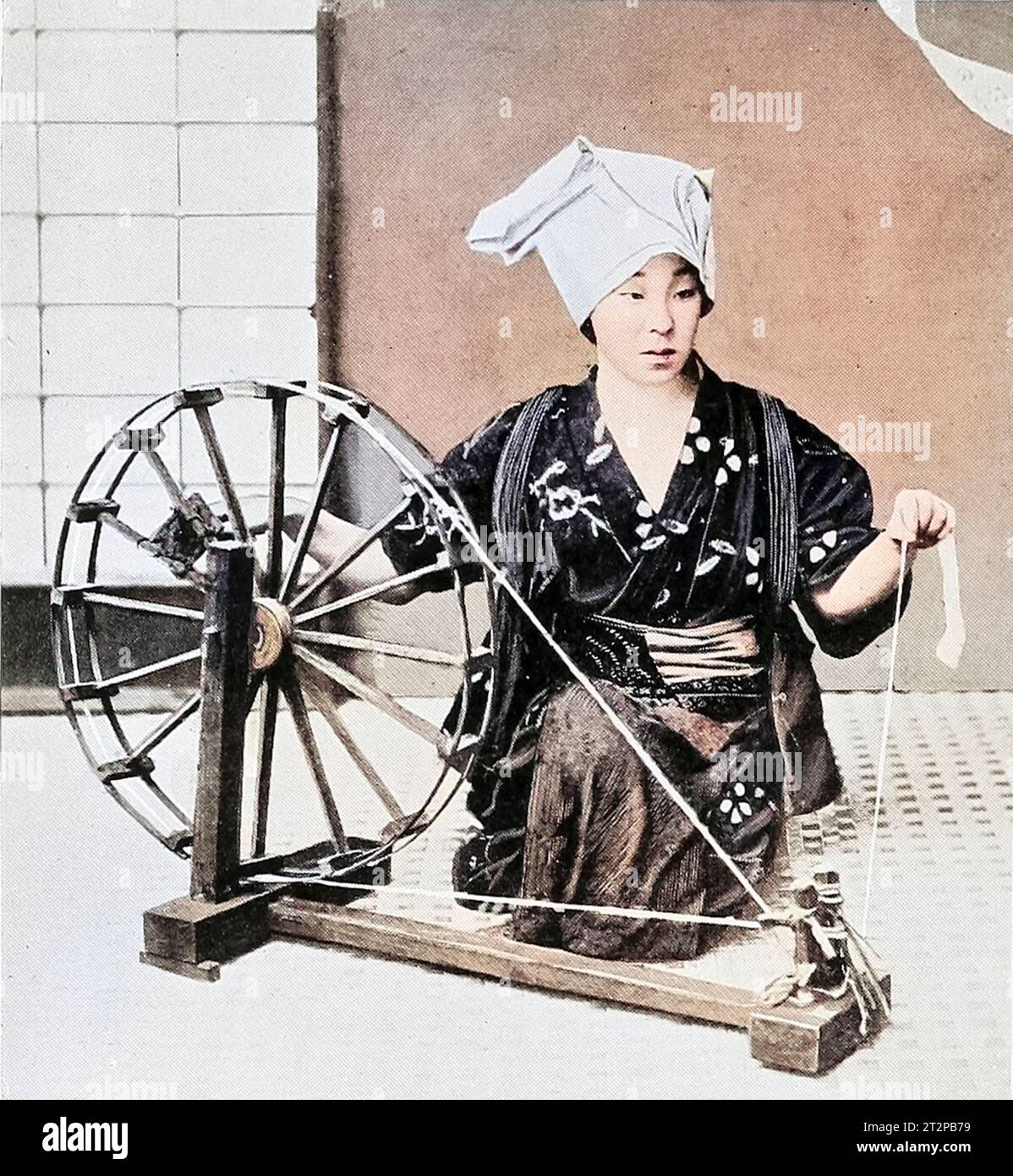 Japanese peasant girl spinning cotton Stock Photo Alamy