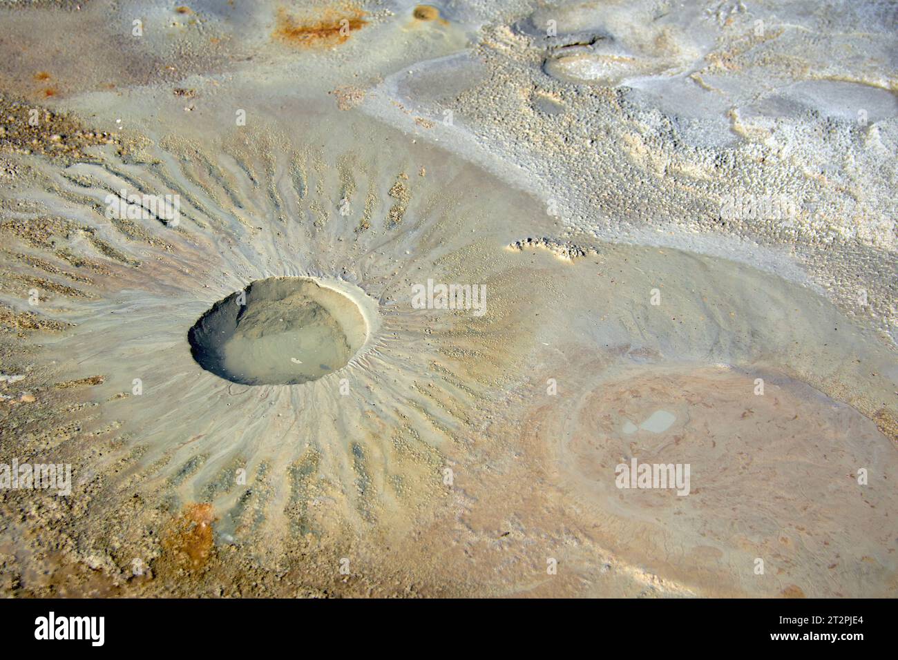 cones of mud volcanoes from which rivers of mud flow Stock Photo
