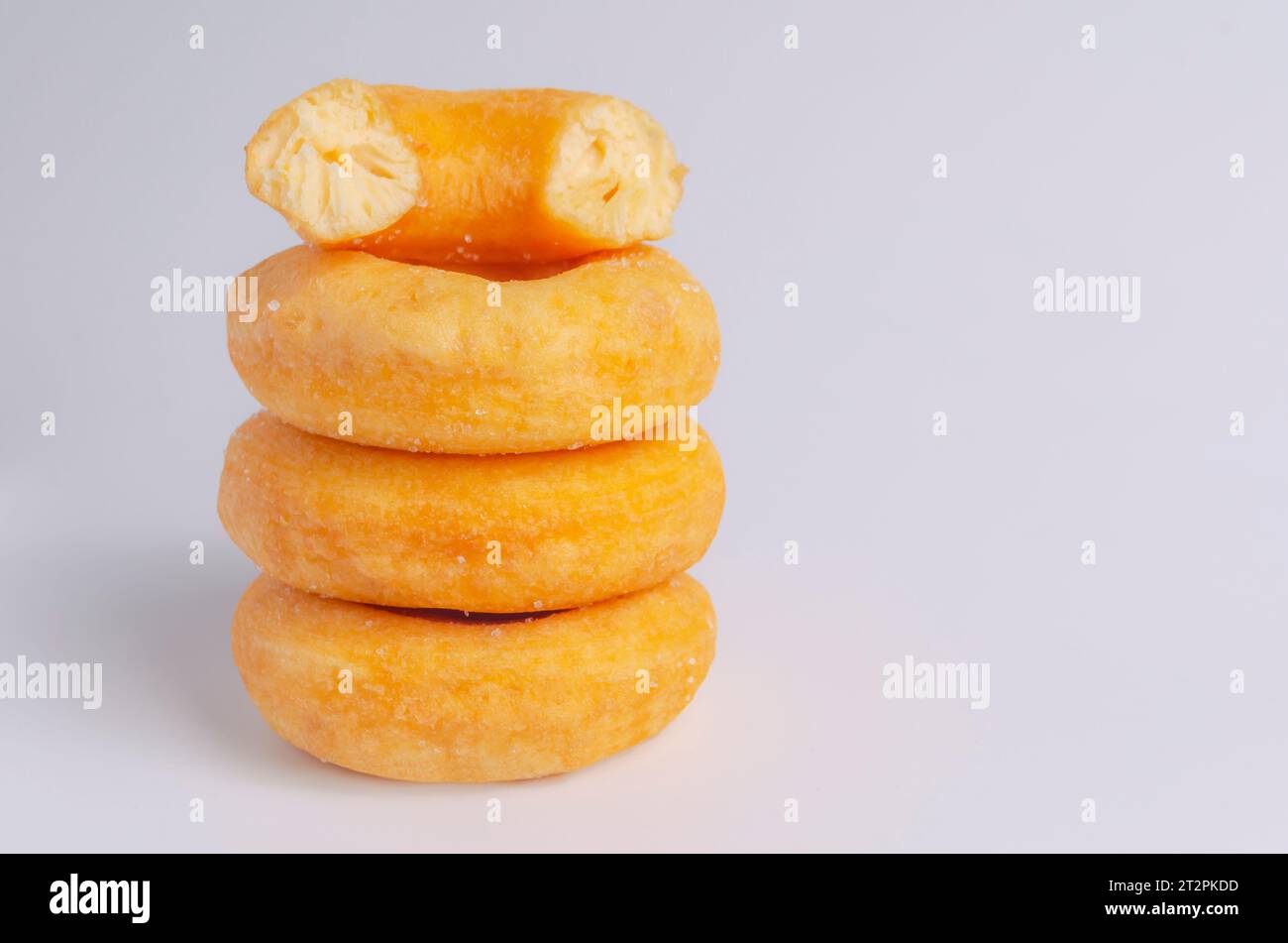 Donuts cake bakery sprinkled with sugar on white background Stock Photo
