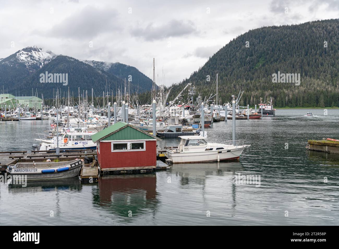 The Harbour master's hut and boat with Commercial fishing and pleasure Boats in the Marna