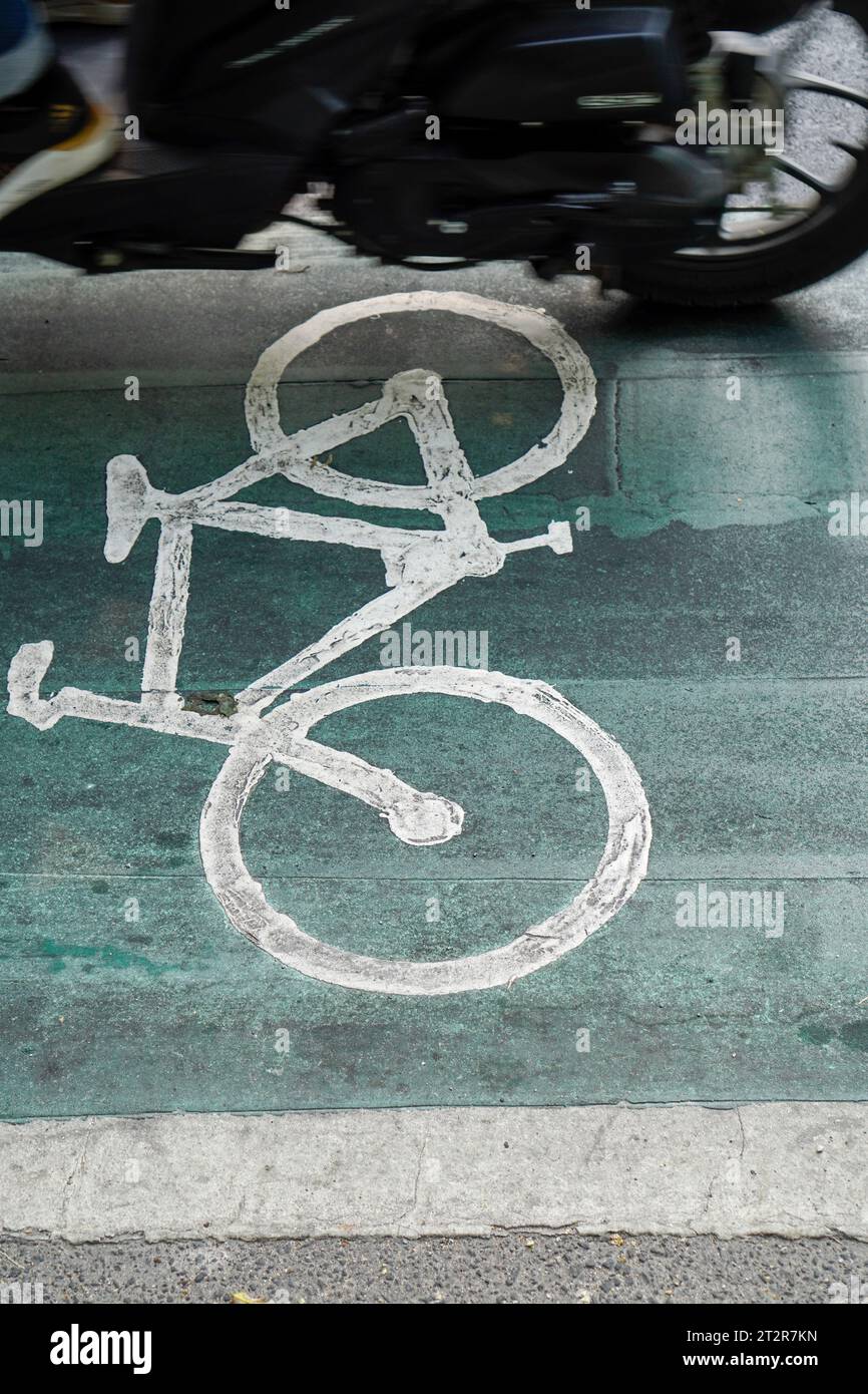 bicycle lanes designated for cyclists, traffic signs painted on the ...