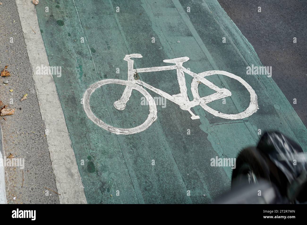 bicycle lanes designated for cyclists, traffic signs painted on the ...