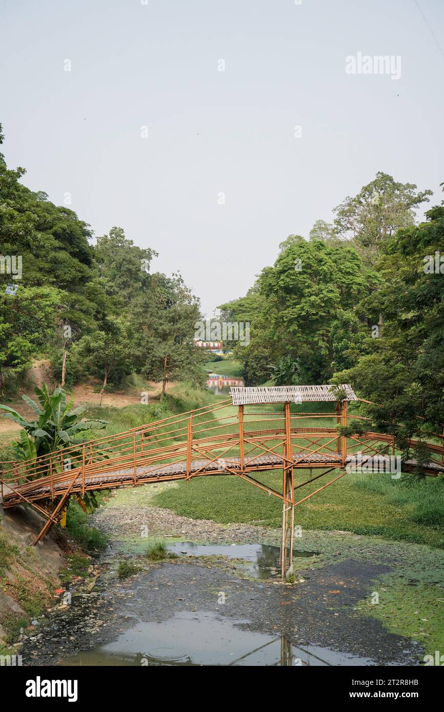 bridge for crossing made of bamboo, seen from the side with a wide angle, Stock Photo