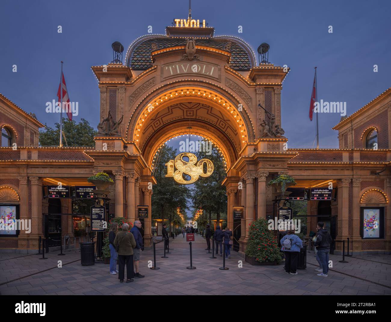 180 aniversary sign at the main entrance gate of  Tivoli Gardens Amusement Park in Copenhagen, Denmark Stock Photo
