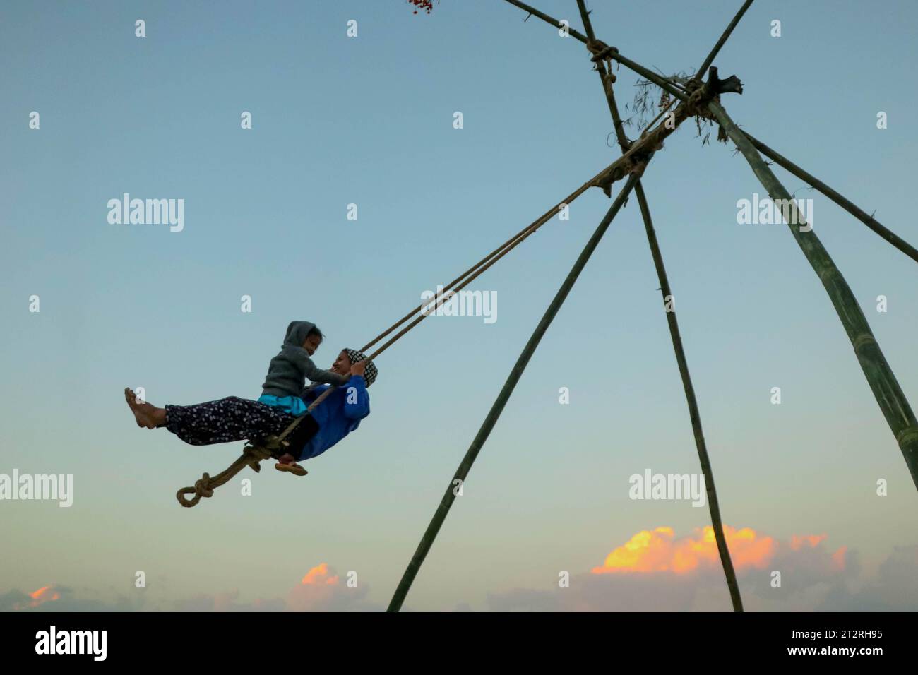 Kathmandu, Nepal. 20th Oct, 2023. A mother and her child enjoy