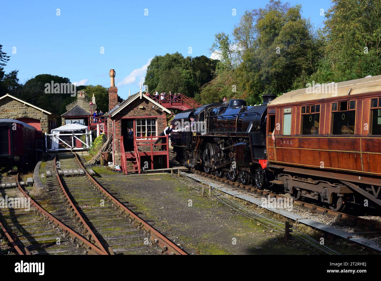 Running tender first, BR Standard Class 4 No 75069 arrives at Goathland on the North Yorkshire Moors Railway during its 50th anniversary gala. Stock Photo