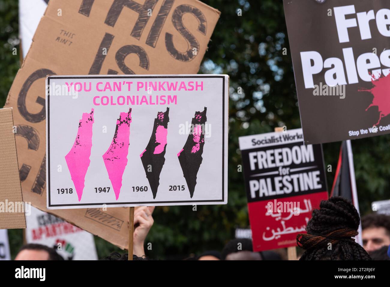 Park Lane, London, UK. 21st Oct, 2023. A protest is taking place against the escalation of military action in Gaza as the conflict between Israel and Hamas continues. Organised by groups including Palestine Solidarity Campaign and Stop the War Coalition, titled ‘National March for Palestine’ and with calls to ‘free Palestine’, ‘end the violence’ and ‘end apartheid’. Maps illustrating shrinking Palestine land areas Stock Photo