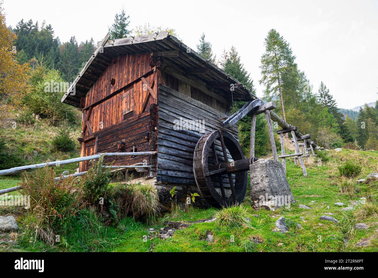 Old water mill in the mountains Stock Photo