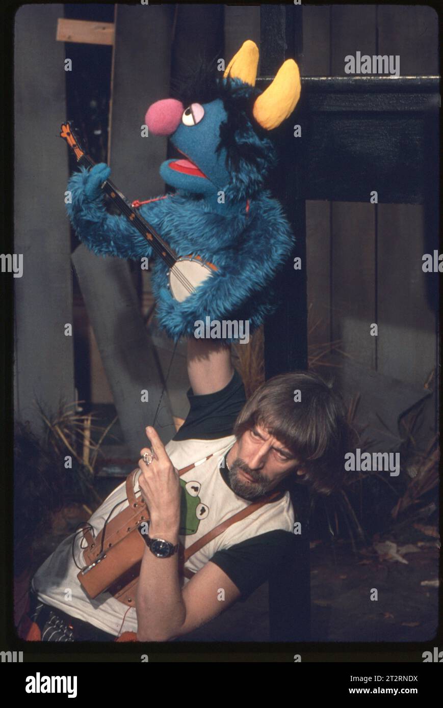 At a 1977 Sesame Street rehearsal, Carroll Spinney operates the banjo playing muppet, Harvey
