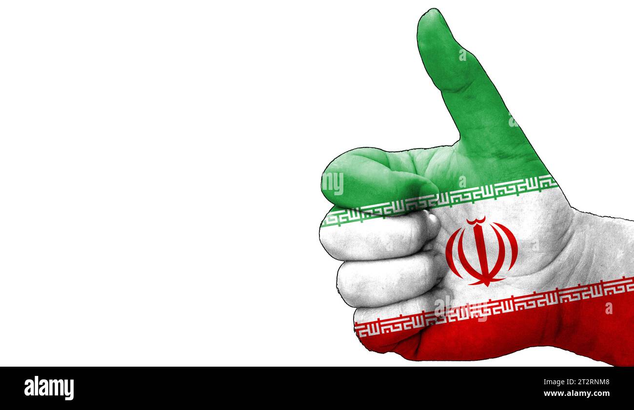 hand with thumbs up in approval with the Iranian flag painted. Image ...