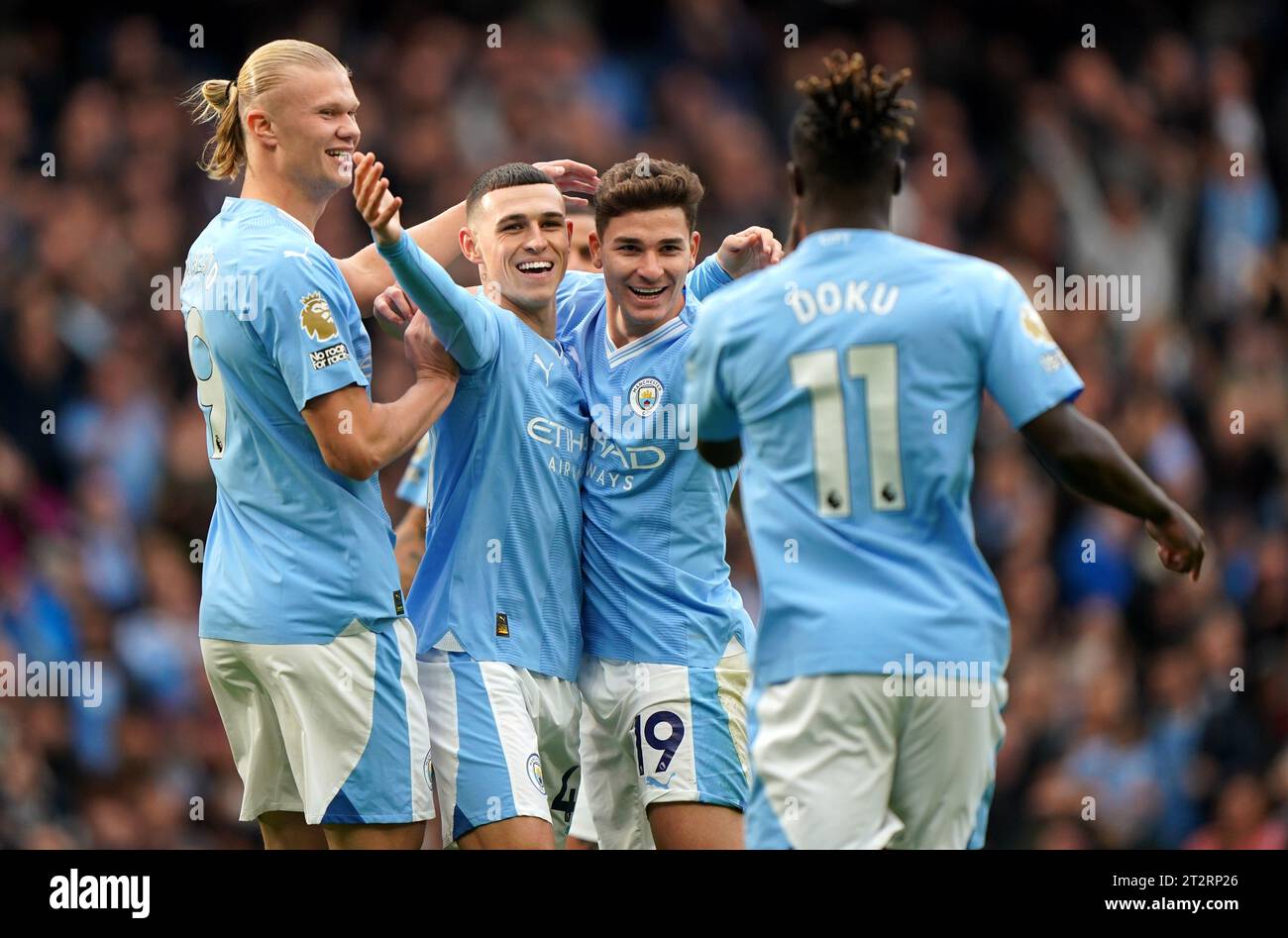 Manchester City's Julian Alvarez (second right) celebrates scoring their side's first goal of the game during the Premier League match at the Etihad Stadium, Manchester. Picture date: Saturday October 21, 2023. Stock Photo
