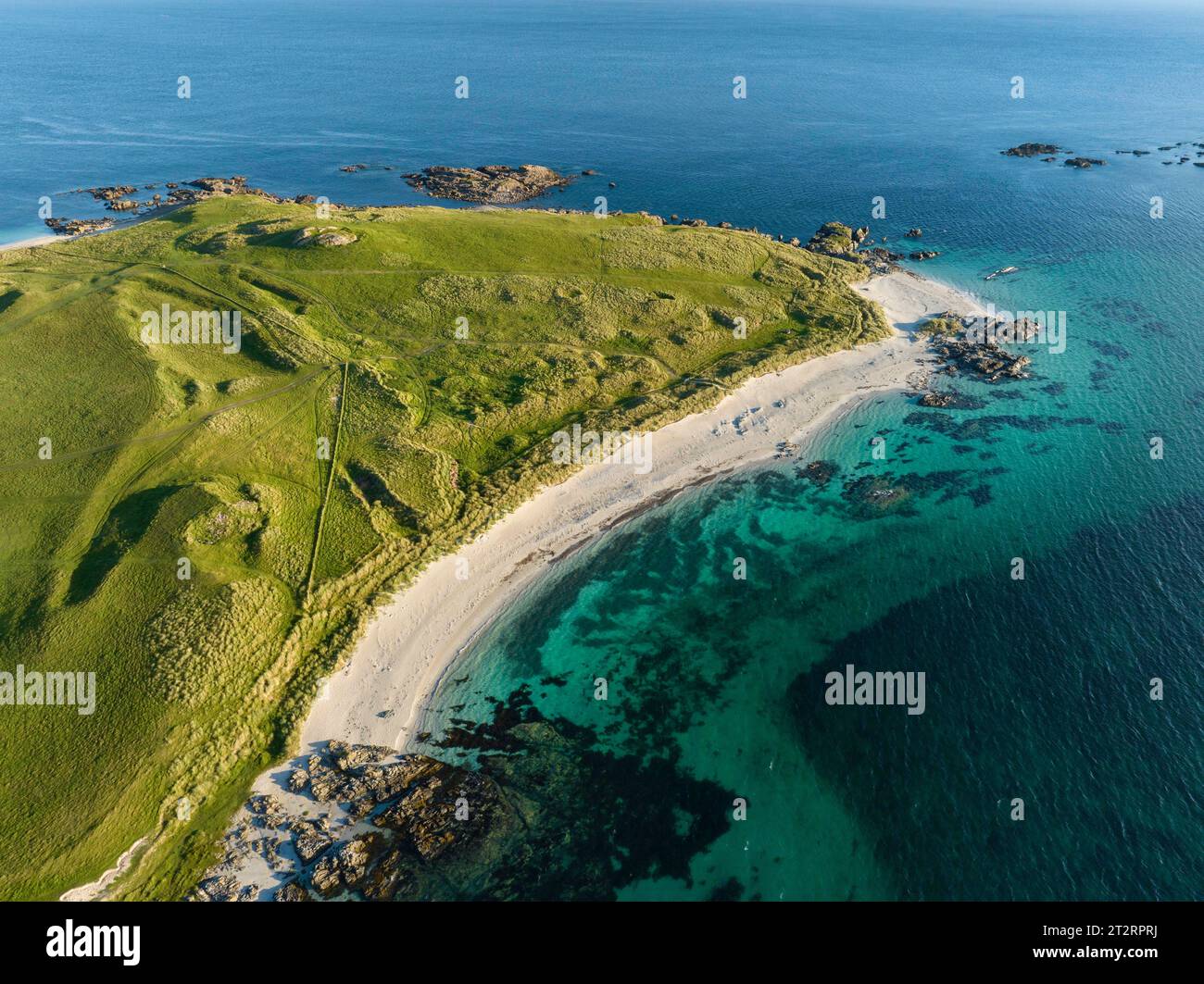 Aerial view of the sandy beach, White Beach, also White Strand of the Monks in the morning light on the Hebridean island of Iona, Isle of Mull Stock Photo