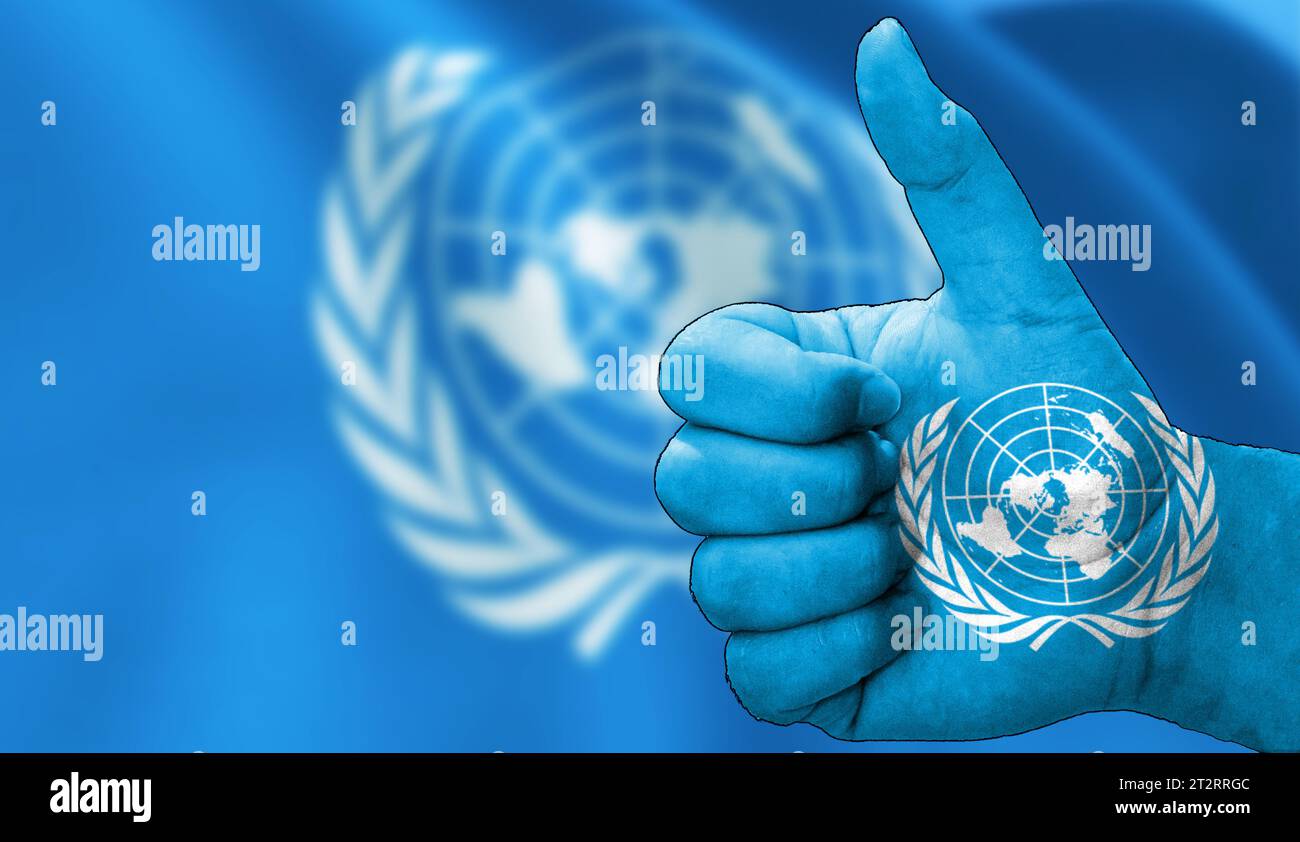 thumbs up in approval with the United Nations flag painted Stock Photo ...