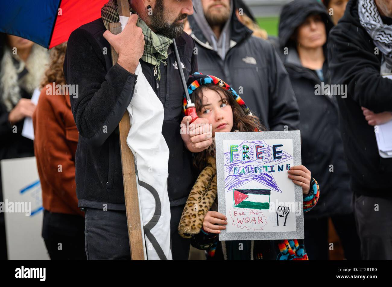 Montpelier, USA. 20th October, 2023. Participant holds a Free Palestine sign during a gathering at the Vermont State House in Montpelier, VT, USA, to mourn the victims of strife in Israel and Gaza. Credit: John Lazenby/Alamy Live News Stock Photo