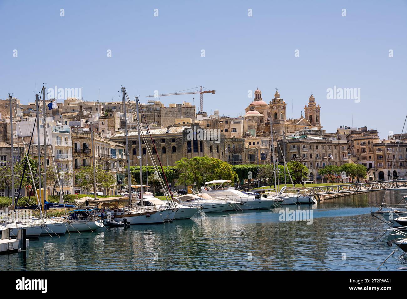 Vittoriosa, Malta - 17 June 2023: harbor and the Collegiate Church of Saint Lawrence in Vittoriosa Stock Photo