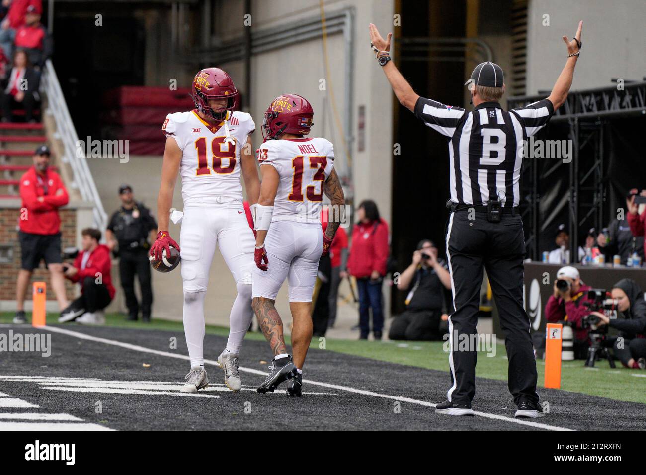 Iowa State's Benjamin Brahmer (18) celebrates with Jaylin Noel (13) after making a touchdown catch during an NCAA college football game against Cincinnati, Saturday, Oct. 14, 2023, in Cincinnati. (AP Photo/Jeff Dean) Stock Photo