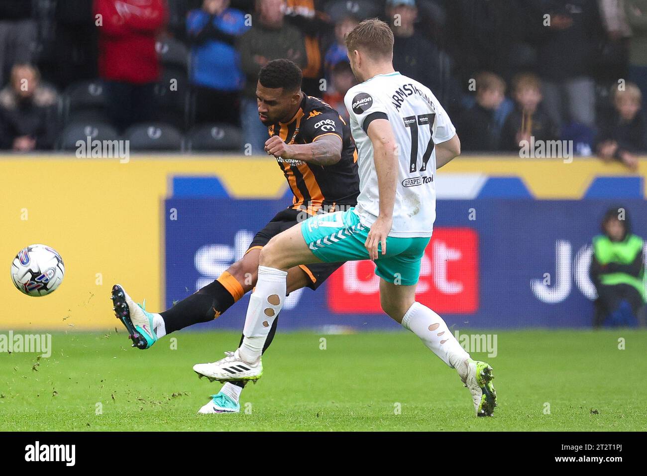 Cyrus Christie of Hull City gets the ball past Stuart Armstrong of ...