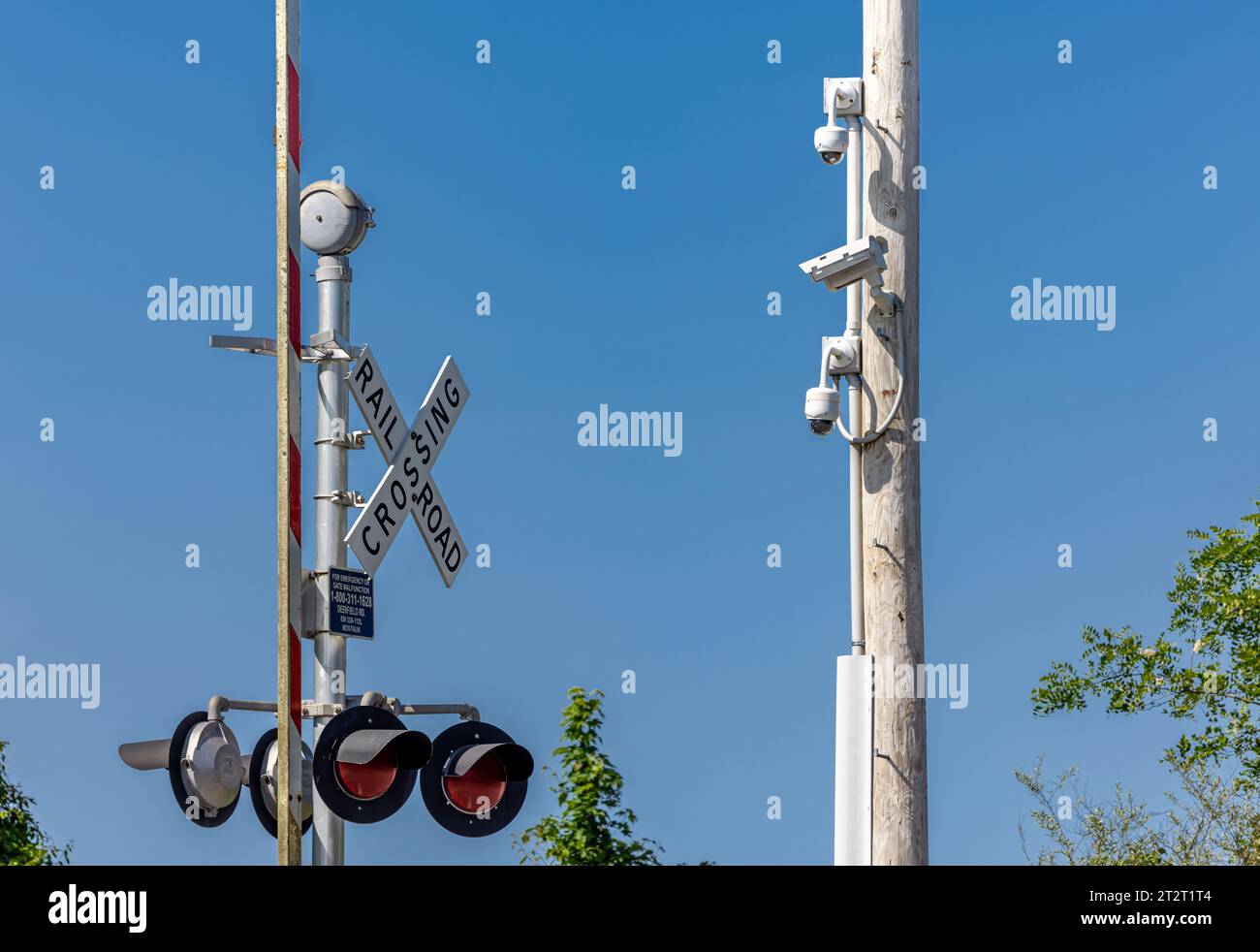detail of of lirr railroad crossing with lights, cameras and sounds