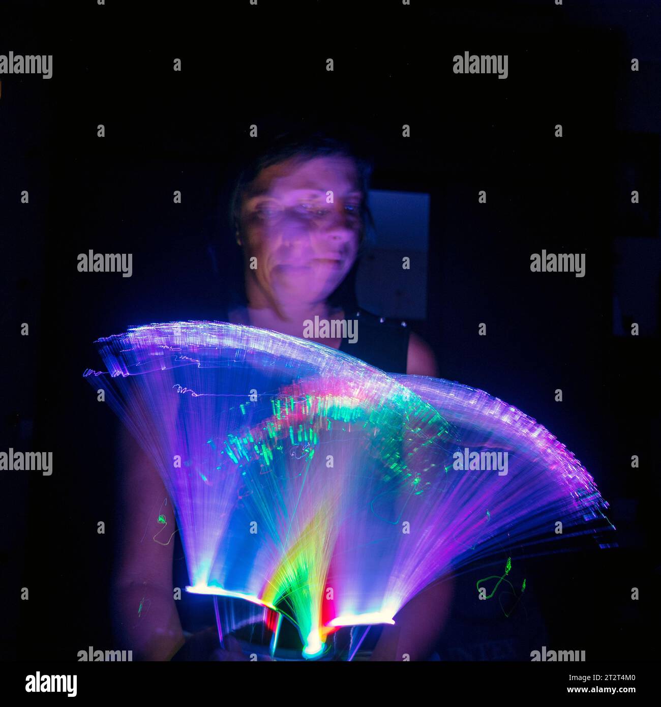 beautiful and colorful light paintings, abstract light lines and human