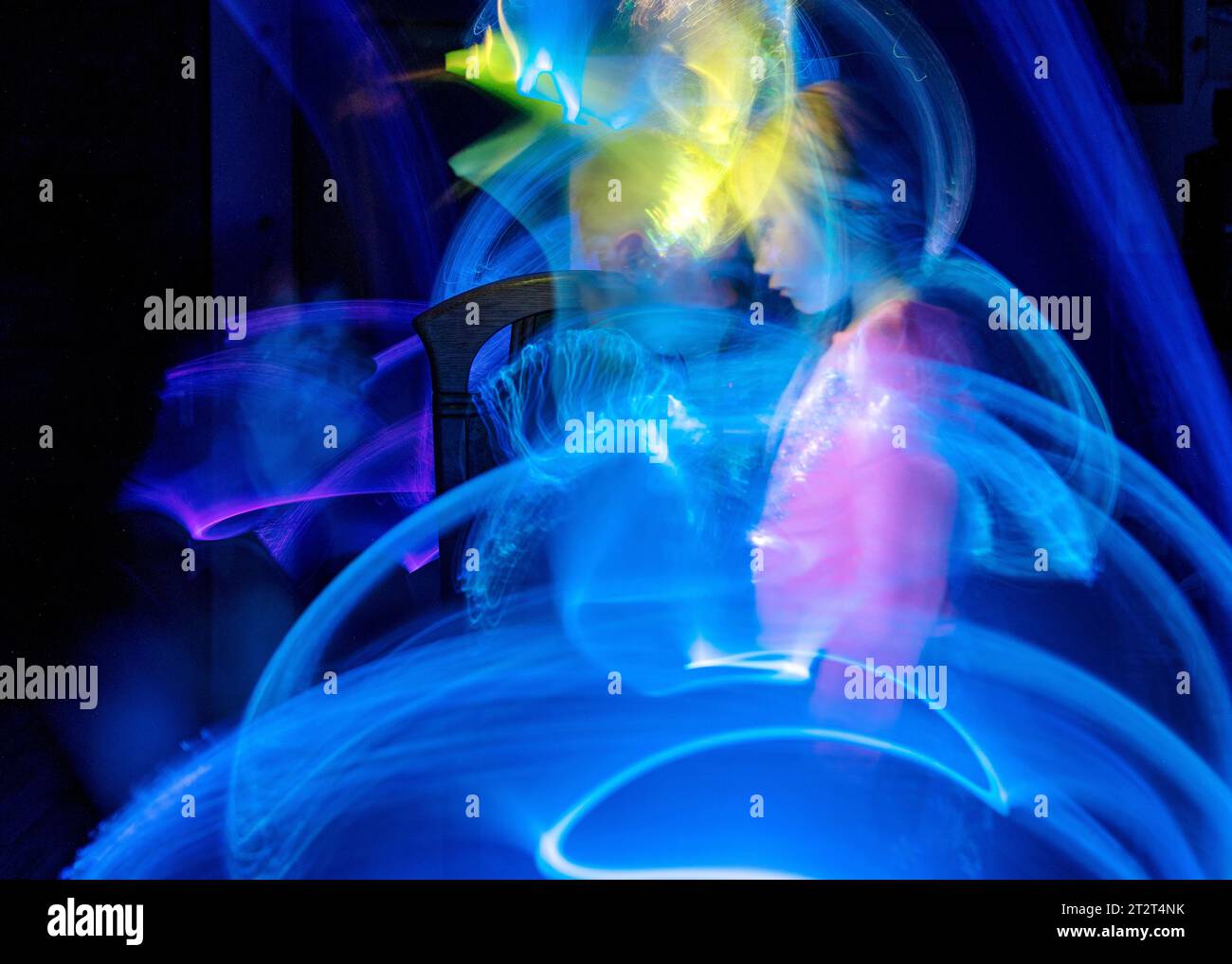 beautiful and colorful light paintings, abstract light lines and human