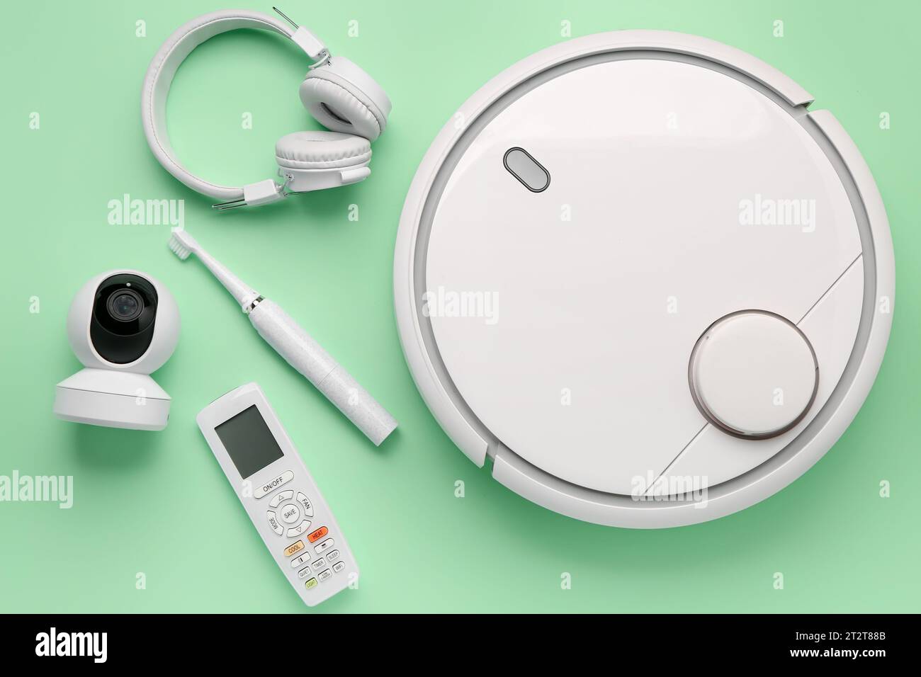 Modern gadgets on green background Stock Photo