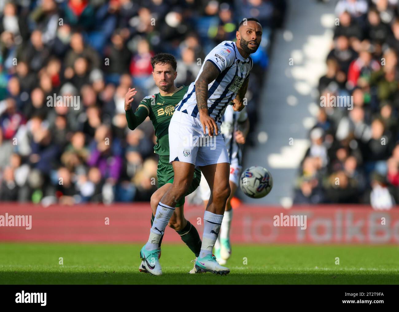 Ryan Hardie #9 of Plymouth Argyle battles for the ball during the Sky ...