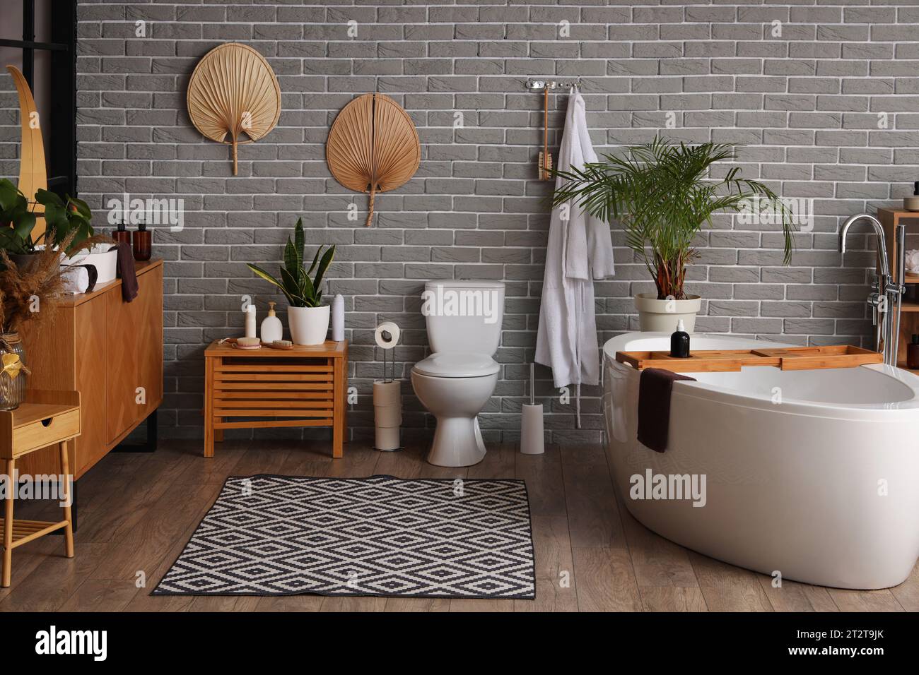Interior of modern bathroom with bathtub and toilet bowl Stock Photo ...
