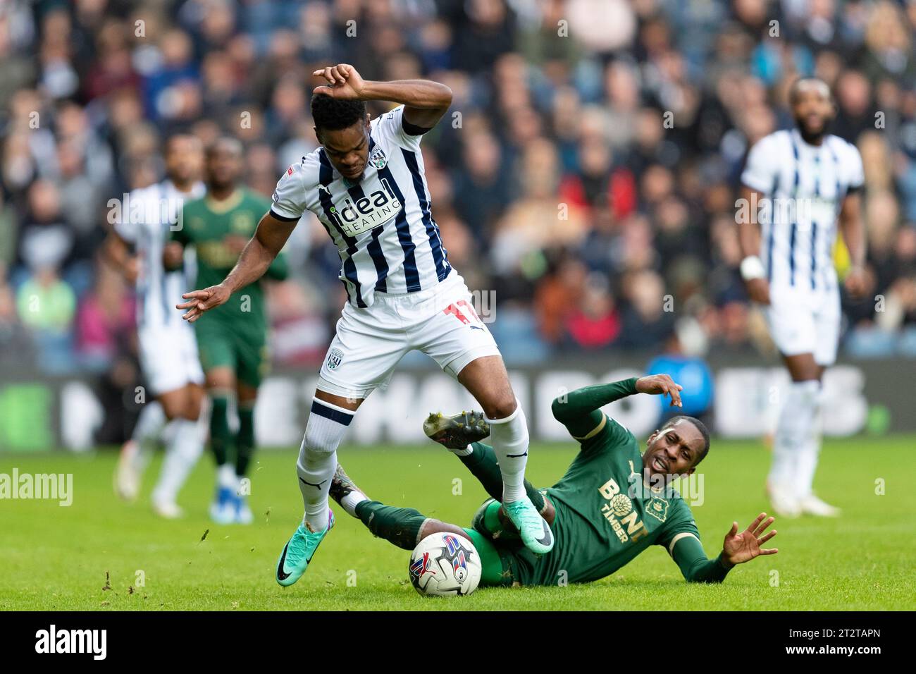 West Bromwich, UK. 21st October 2023. Grady Diangana of West Bromwich (L) and Mickel Miller of Plymouth Argyle in action during the Sky Bet Championship match between West Bromwich Albion and Plymouth Argyle at The Hawthorns, West Bromwich on Saturday 21st October 2023. (Photo: Gustavo Pantano | MI News) Credit: MI News & Sport /Alamy Live News Stock Photo