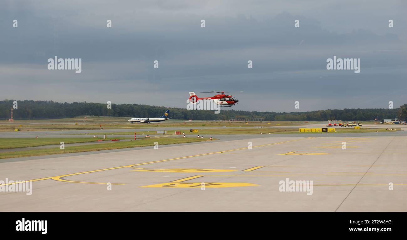 Nuremberg, Germany - August 10th:  DRF Air medical services an a Ryanair Plan Crossing. Stock Photo