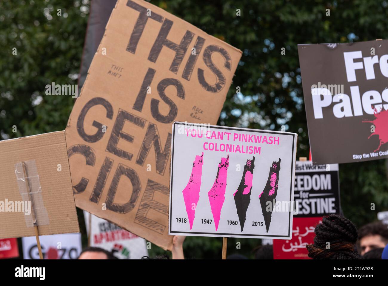 Colonialism placard at a Free Palestine protest in London following the escalation of the conflict in Israel and Gaza. Maps of alleged occupation Stock Photo