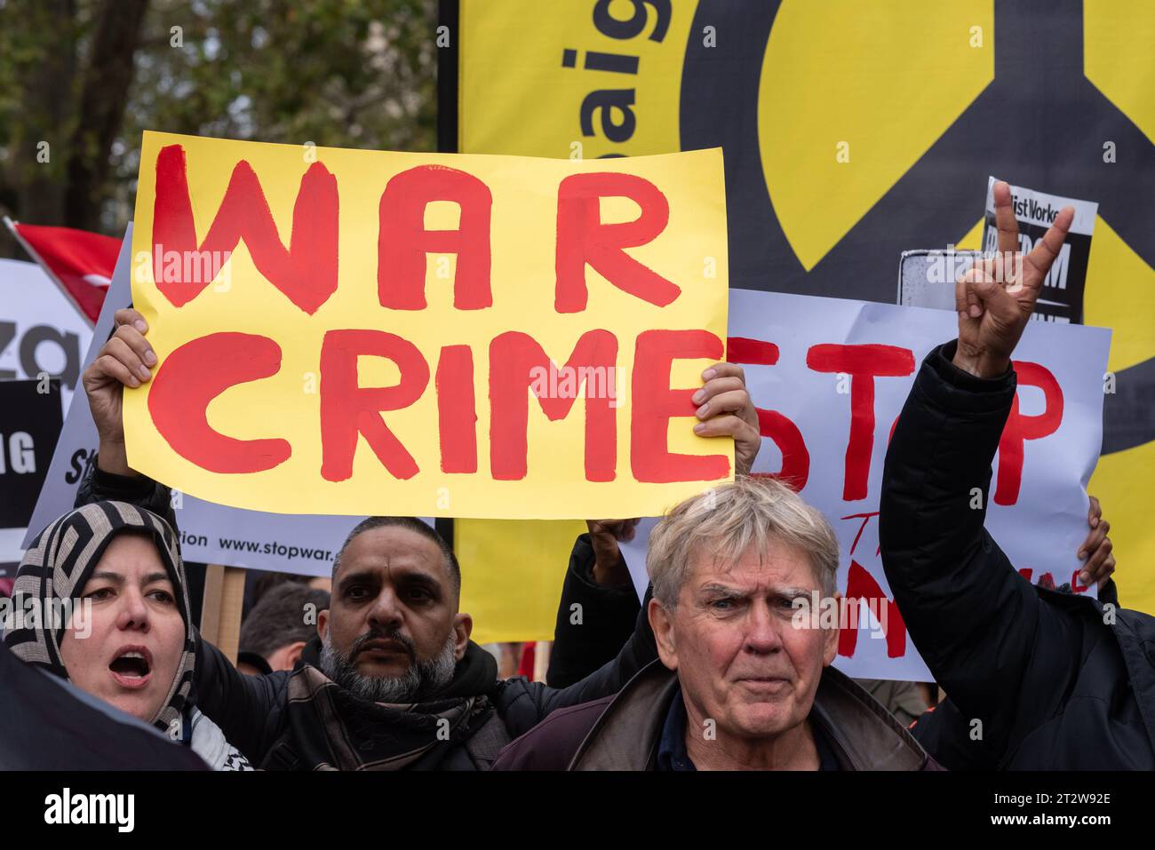 War crime placard at a Free Palestine protest in London following the escalation of the conflict in Israel and Gaza Stock Photo
